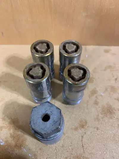 Wheel lock lugs. 22mm off a 2020 Silverado 1500. Add will be removed immediately when sold. Thanks f...