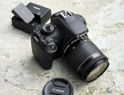 Canon T5 18MP DSLR w/ lens and extras, View more