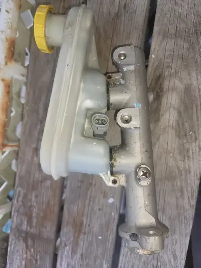 Was probably a spare when I was driving these cars. Sold ad is. Other parts top.