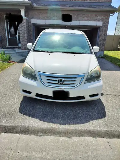 I am selling a white 2008 Honda Odyssey, a reliable and spacious minivan perfect for families. This...