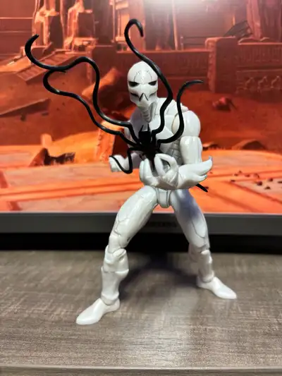 Marvel Legends Figure from my own personal collection. Poison - 25 Mint , loose, complete. Displayed...