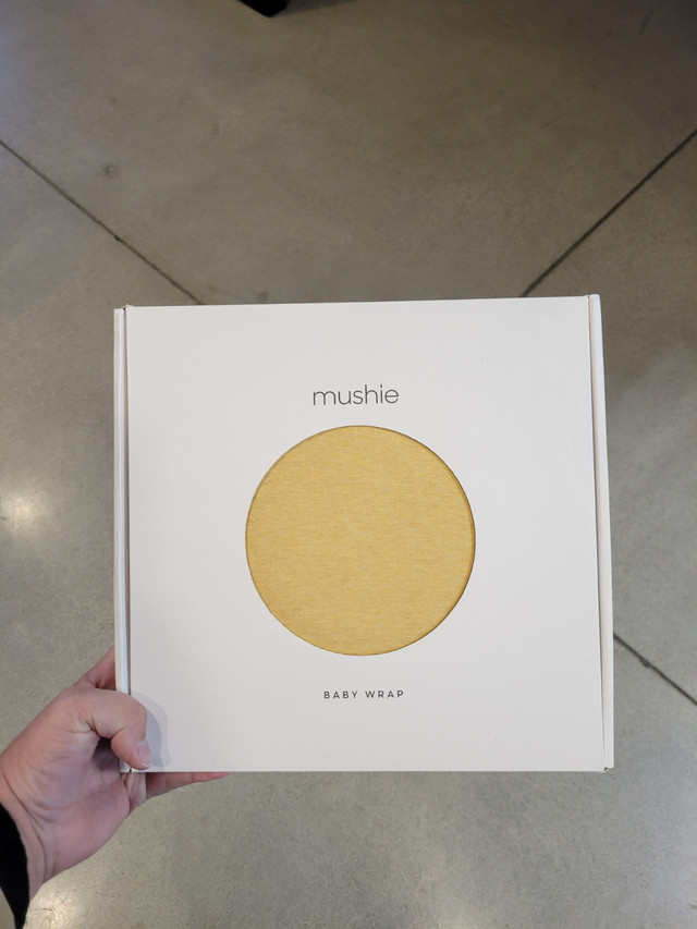 Mushie Baby Wrap - Brand new in Box in Strollers, Carriers & Car Seats in Winnipeg