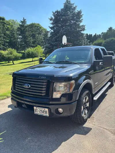 Selling my reliable 2011 Ford F150, a robust pickup truck that's ready for anything, featuring a pow...