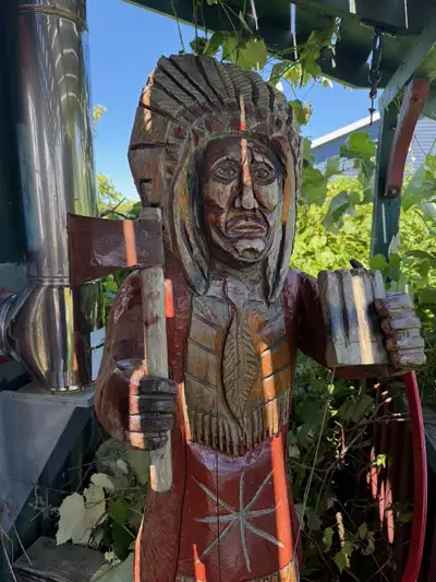 I am offering an unique and special chainsaw caving on a cigar indian done for me by the now world f...