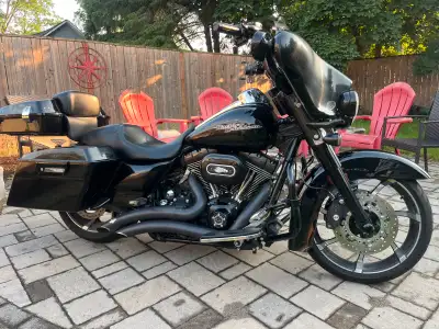 I'm selling my used 2011 Harley Davidson Street Glide, a sleek black touring motorcycle with 22,804...