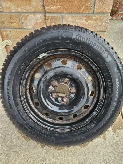 Set of 4 winter tires on steel rims. Continental Wintercontact 215/65/R16 on 16x6.5 steel rims. Pric...