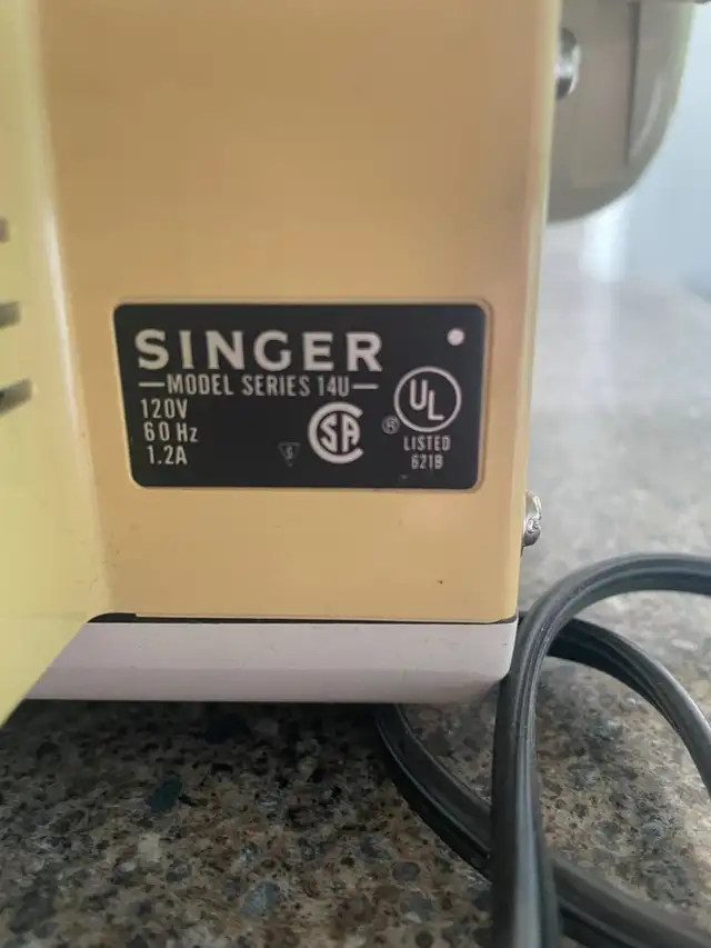 Singer Serger473663623912509442