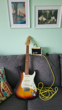 Electric Guitar Stratocaster Amplifier and Cables
