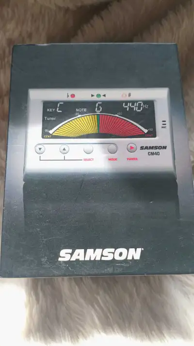 I am selling a Samson CM40 Chromatic Tuner that offers precision tuning and metronome capabilities f...