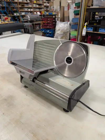 A good condition meat slicer available for sale.