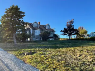 Beautiful furnished home with ocean view and a short walk to the beach. Two bedrooms upstairs and on...