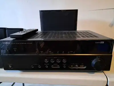 Experience immersive audio with the Yamaha RX-V373 5.1 Channel AV Receiver, delivering powerful soun...