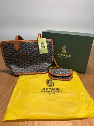 This is a beautiful, nearly new Goyard mini tote bag, perfect for adding a touch of luxury to your e...