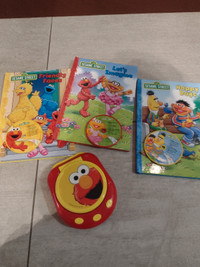 Elmo and sesame Street books and musical CDs 