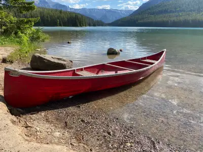 14 foot long fiberglass canoe Lightweight, no leaks. Why pay for a rental when camping in banff or k...