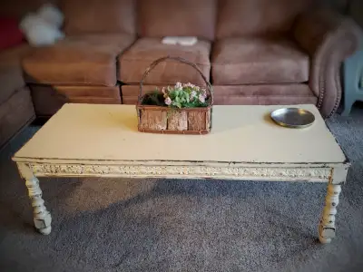 Pale Yellow Vintage Style Coffee Table. 48" x 20" x 15" high. $40. FCFS.