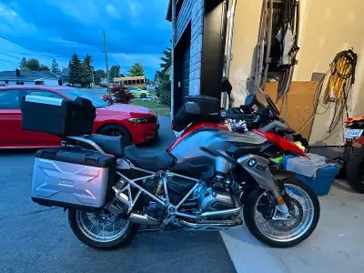 This bike got everything cruise heated grip GPS front light protector crash bar all the aluminum cas...