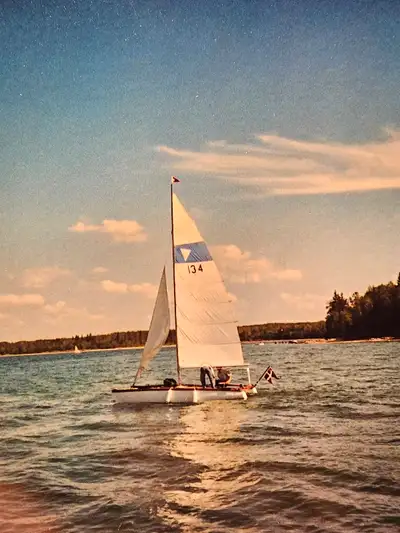 15' catamaran with trailer. Not certain of make. Trailer in very good condition. Solid bridgedeck. B...