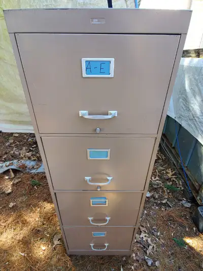 For sale a four Drawer Upright Commercial Fieling Cabinet. The measurements are as follows: 52.5 inc...
