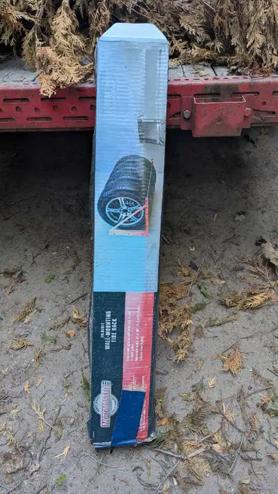 Original in box, never used. Just been sitting in storage. Organize your tires with this Motomaster...