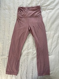 Light pink Lululemon leggings size 4 cross waist 