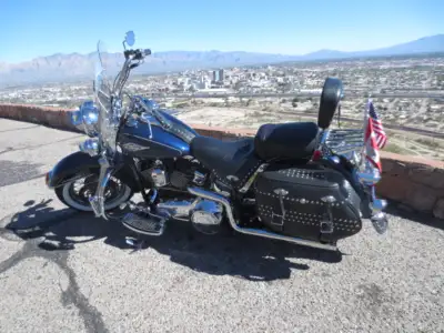 Better than new this HD Heritage softail classic in Big Blue Pearl is well taken care of never dropp...