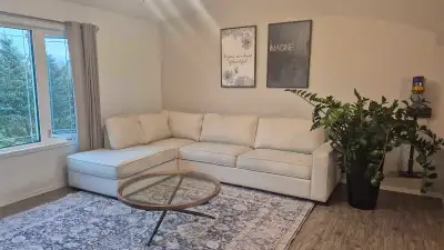 Off white Sectional. Back cushions are removable with zippers Huge and smoke free home. Measures 121...