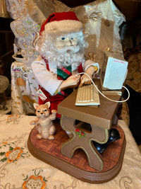 Vintage Telco Motionette Animated Santa Claus on computer