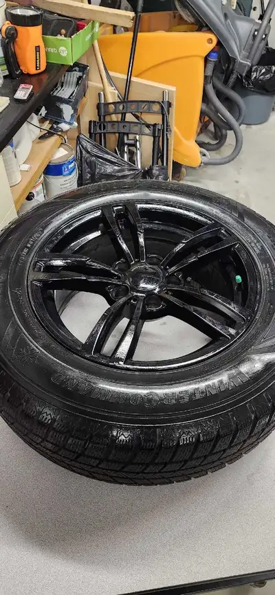 For Sale is a Like New set of 4 Goodyear Winter Command 235 65 17 tires on Black 5x120 Bolt pattern...