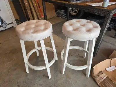 Enhance your home bar or kitchen counter with this brand new set of 2 swivel bar stools. These stool...