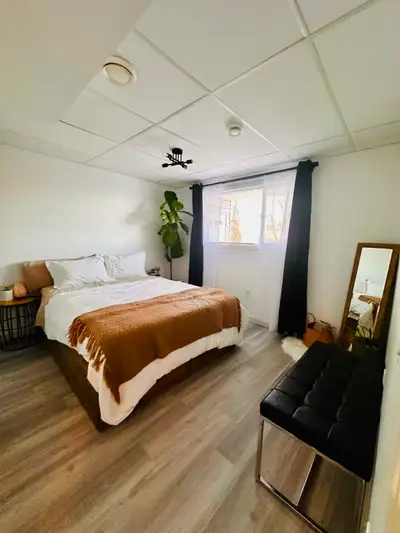 Escape to this charming basement suite tucked away with mountain views, privacy, and easy access to...