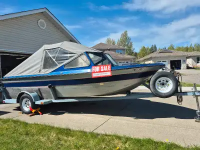 19 ft Aluminum welded River Boat with 7.5 up out board motor. 175 Sport Jet. Custom cover. Single ax...