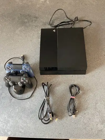 Playstation 4 with 2 controllers and HDMI cable.