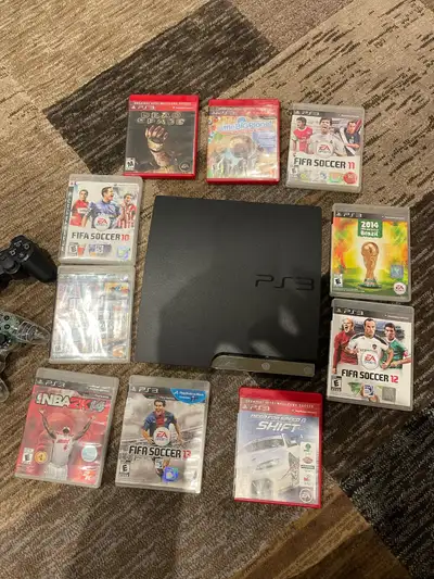 Sony PlayStation 3 console. Includes two controllers and nine games: FIFA Soccer 10, FIFA Soccer 11,...
