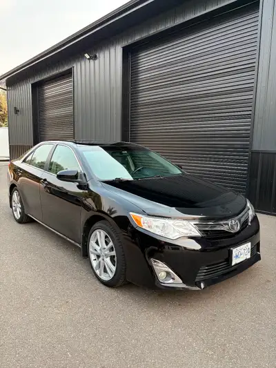 2012 Toyota Camry. XLE time (highest). Has the very desirable and reliable V6 (268hp). Quick but sti...