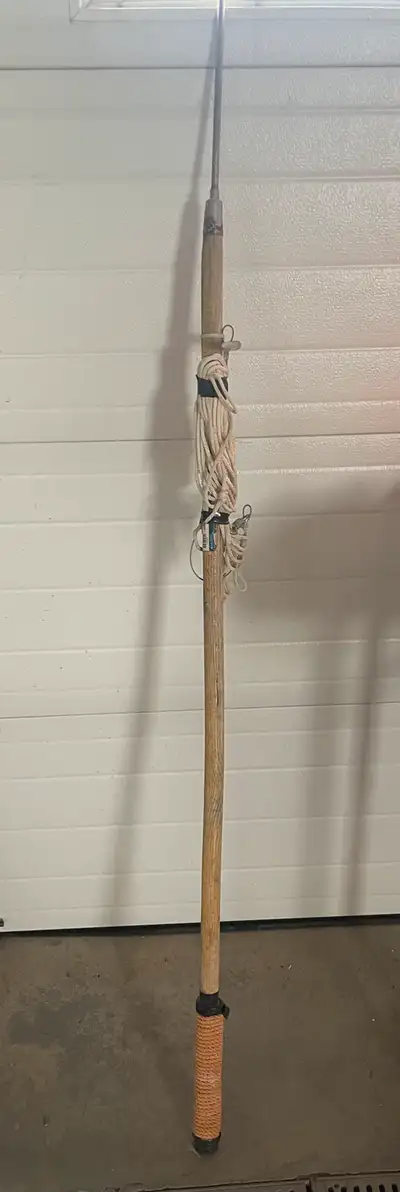 This halibut spear is in good, used condition and retriever rope also detatchable tip. The spear fea...