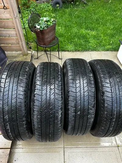 Selling a set of 4 265/70/R17 Bridgestone Dueler H/T tires off my Toyota 4Runner. 70% tread left lot...