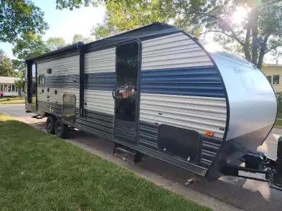 I'm selling my 2022 Grey Wolf Limited, a well-maintained travel trailer that's ready for your next a...
