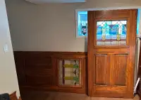 Two solid stained glass doors with hardware