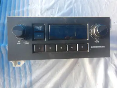 Vintage radio . Model 4311002 . 5 preset channels . 2ND similar radio without knobs for $5 . 780-915...