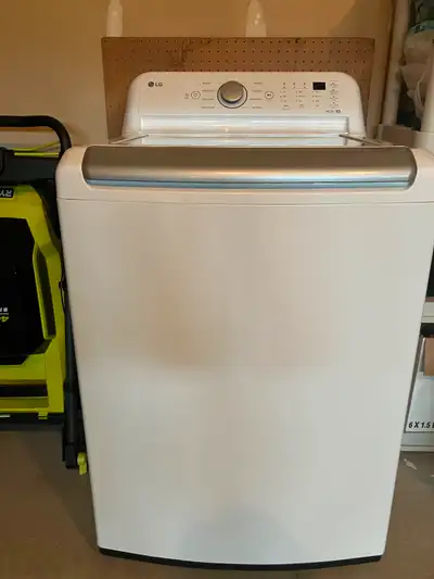 WASHER LG USED ONLY 4 months as it didn’t fit under cabinet due to top loading. Perfect condition. M...