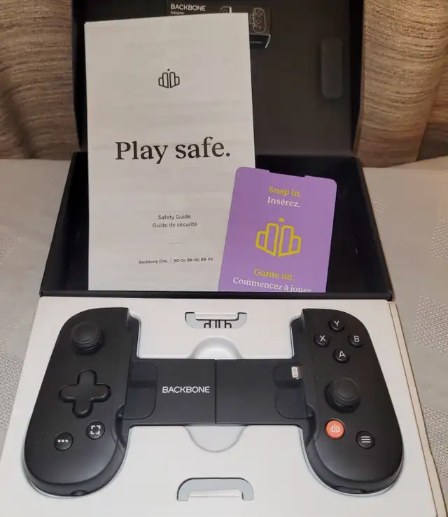 Original PS 1 - 30 game holder / Backbone One iphone controller in Older Generation in Red Deer - Image 8