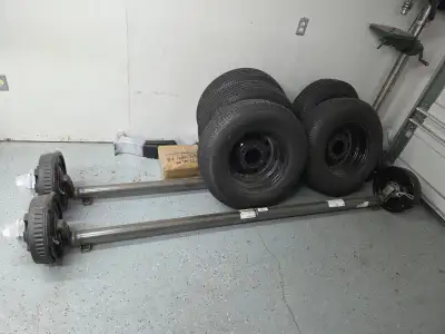 A registered tandem trailer that was being rebuilt that I no longer need. Included: - 2 5200lb axles...