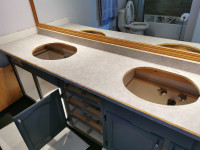 Two laminated bathroom countertops in excellent shape.