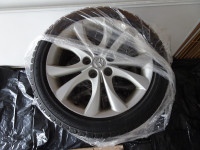 Four OEM Rims for Mazda 3 GT with 205/50 R17 winter tires