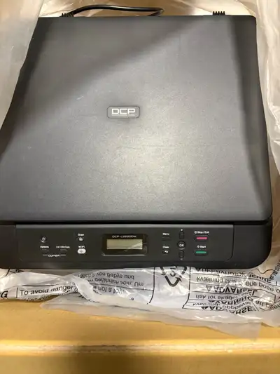 Description: Fully working Brother DCP-L2520DW black & white laser printer. • Print / Scan / Copy •...