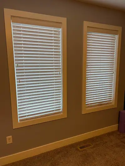 Clean white Hunter Douglas blinds. Set of two. Each blind is 27.5 inches wide by 57 inches long. Hor...