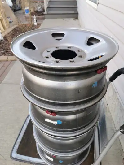 A set of 4 very good condition steel rims. They were used on GMC Passenger Van. They may fit on Ford...