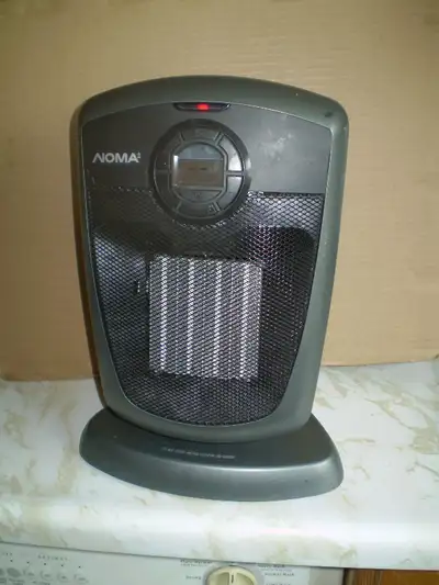 NOMA CERAMIC HEATER-1500 WATTS-OSCILLATES-LCD READOUT- $25, View more