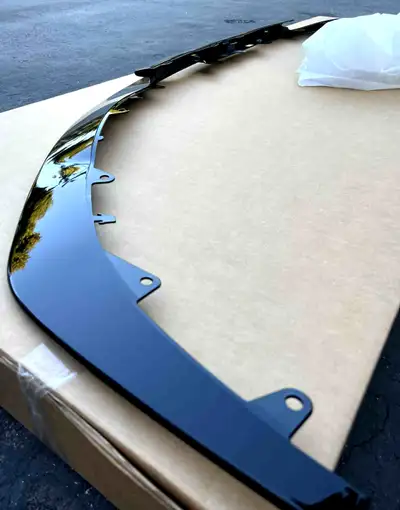 Acura Genuine OEM Front Bumper Splitter Brand new in the box. Manufacturer Part Number: 711575-TGZ-A...